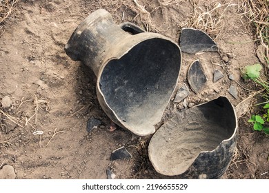 Excavations of ancient clay jugs. The process of searching for historical relics. Broken earthenware jug for wine on the ground. - Shutterstock ID 2196655529