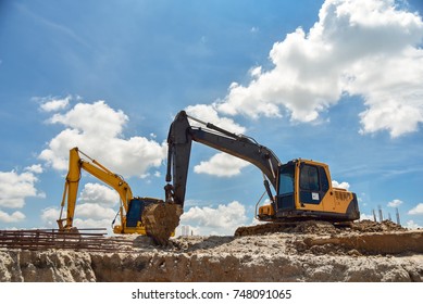 excavator blue sky heavy machine construction site