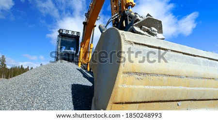 Similar – Bucket-wheel excavator in the Garzweiler 2 open-cast lignite mine, lignite-fired power plants in the background