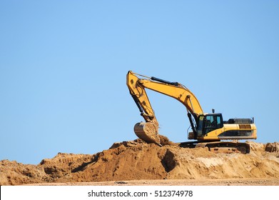 Excavator In Construction Site