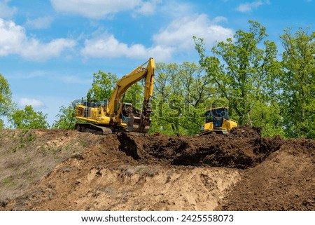 excavator digging the ground sand work hydraulik