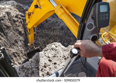 Excavator Digging Hole Ground