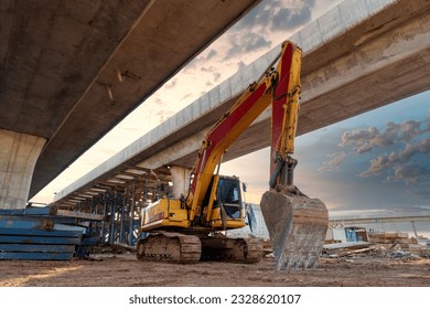 Excavator heavy machine at Structure road construction of expressway under construction. New road construction. Civil Engineer. 
