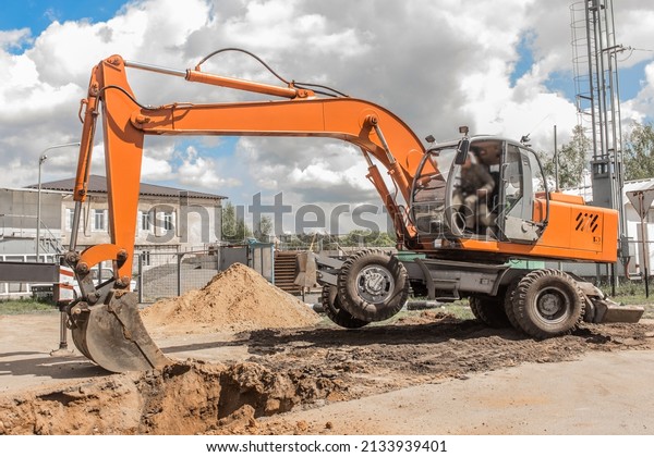 Excavator Industrial Heavy Machine Digging\
Equipment Mechanical Hydraulic Stability Balance Stabilization on\
Construction Site\
Work.