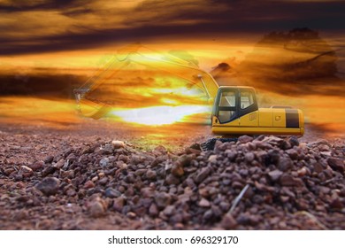 Excavator loader model with light of sunset  background,Concept Double exposure