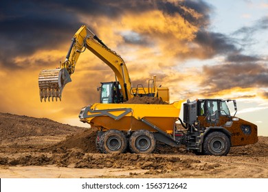 Excavator on a construction site - Shutterstock ID 1563712642