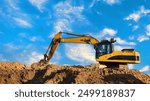 Excavator on earthmoving. Open-pit mining. Backhoe dig sand, ground in quarry. Heavy construction equipment on excavation on construction site. Excavator on groundwork, foundation. Road construction.
