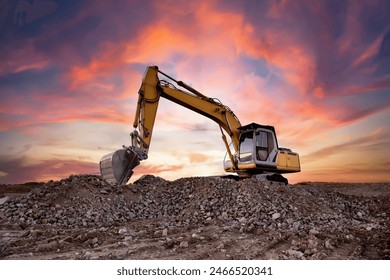 Excavator on earthworks. Excavator on construction site on sunset. Open-pit mining. Backhoe dig ground in quarry. Heavy construction equipment on excavation on construction site. Groundwork building