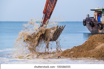 Excavator On The Reclamation Land.