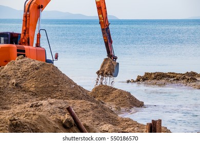 Excavator On The Reclamation Land.