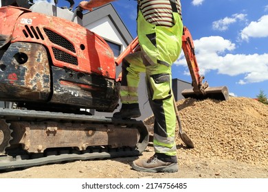 The Excavator Operator Is Getting Ready To Work.