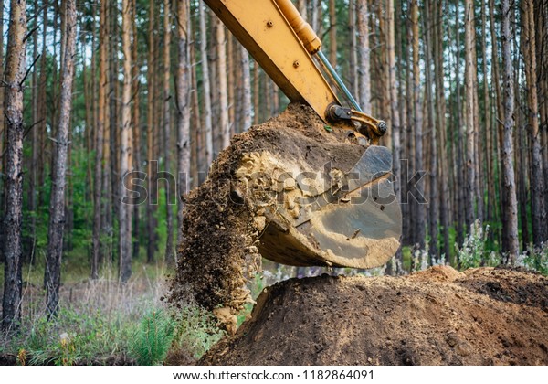 Excavator performs excavation work by digging the
ground with a bucket