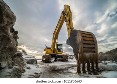 Excavator in snow
