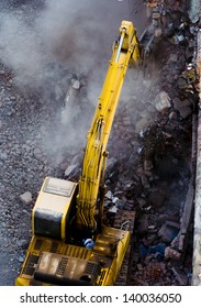 Excavator At Urban Demolition Site