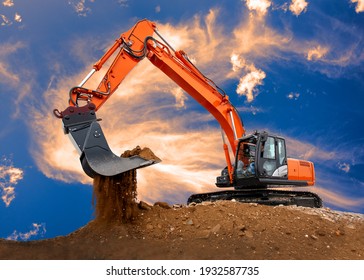 excavator at work on construction site - Shutterstock ID 1932587735