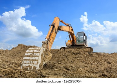 Excavator Working Building Site On Sunny Stock Photo (Edit Now) 1262920960