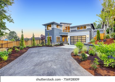 Excellent Curb Appeal Of A Modern Craftsman Style Home Accented By Landscaping, Garage With Glass Door And Long Asphalt Driveway. Northwest, USA