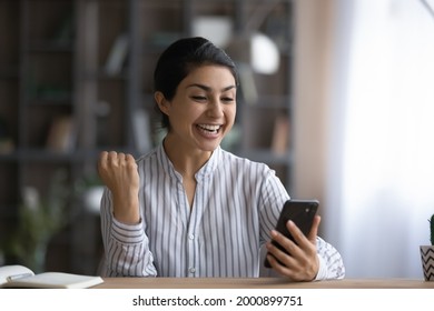 Excellent. Overjoyed Indian Female College University Student Receive Phone Message About Winning Science Fair Getting Money Grant. Lucky Young Teen Lady Celebrate Shocking News Of Unexpected Victory