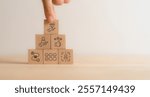 Exceptional service concept. Wooden blocks with exceptional service icons. Providing a positive, helpful and timely experience for customers above and beyond the customer