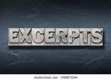 excerpts word made from metallic letterpress on dark jeans background