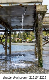 Excess Water Flow Down From Below The  Pier In Redondo Beach, Washington.