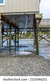 Excess Water Flow Down From Below The  Pier In Redondo Beach, Washington.