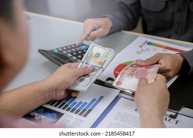 Exchange money, Business peoople exchange Chinese money (Yuan) for Dollars money. Business exchange and investment concept - Shutterstock ID 2185458417