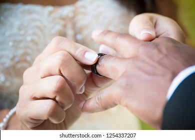 exchange of rings ceremony - Shutterstock ID 1254337207