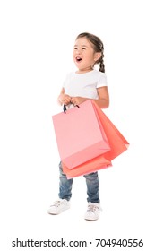 Excited Asian Kid With Shopping Bags, Isolated On White