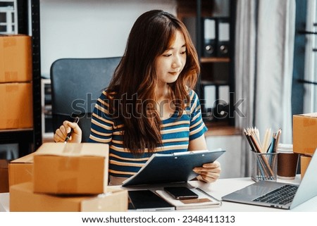 Excited Asians start small businesses, SME entrepreneurs, distribution warehouses with post boxes. owner's small home office, fresh graduate, social media influencers impact on society