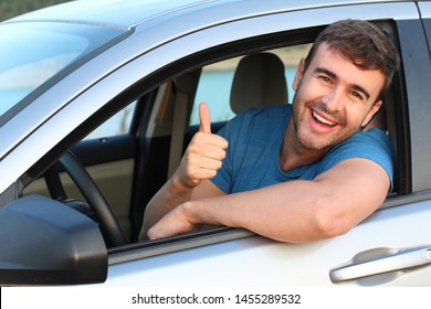 Excited Car Driver Giving A Thumbs Up 