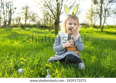Excited child eagerly hunts for Easter eggs, their basket becoming a treasure trove of springtime happiness.