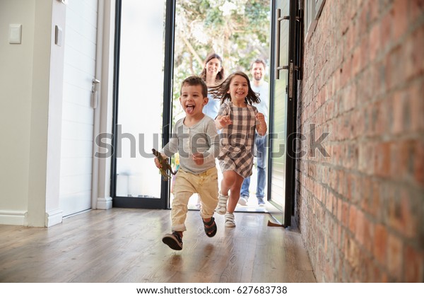 Excited Children\
Arriving Home With\
Parents