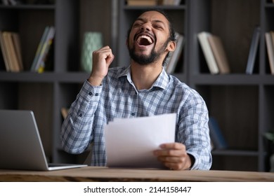 Excited Euphoric Black Student Guy Receiving Admission Letter From School, University, College, Reading Paper Document, Shouting For Joy, Laughing. Millennial Businessman Getting Income, Good Deal