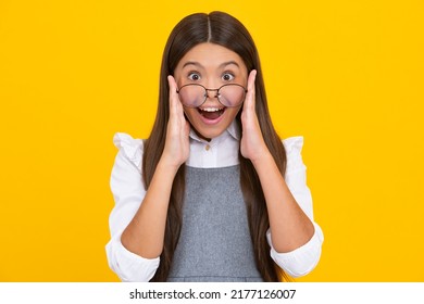 Excited Face, Cheerful Emotions Of Teenager Girl. Portrait Of Teenager Child Girl In Glasses. Kid At Eye Sight Test. Girl With Eyeglasses And Looking At Camera. Vision For Children.