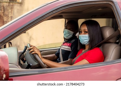 Excited Female Cab Driver Travelling With Her Boyfriend For Vacation Both Wearing Nose Mask