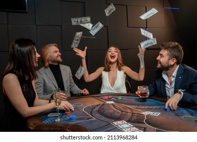 Excited Girl Winning Poker Game, Tossing Paper Money Into Air At Gaming Table