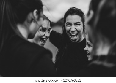 Excited Girls On The Football Field