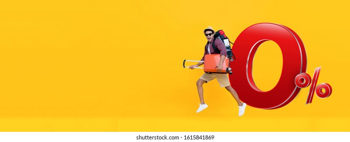 Excited handsome Indian tourist man on yellow banner background with baggage ready to go for travel with 0% interest installment payment plan - Shutterstock ID 1615841869