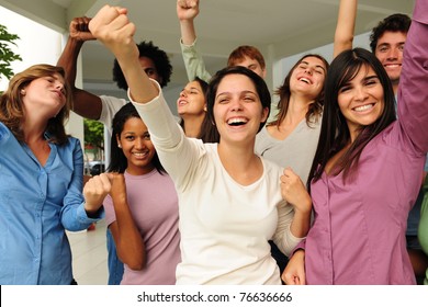 Excited And Happy Group Of Diverse Young People Cheering