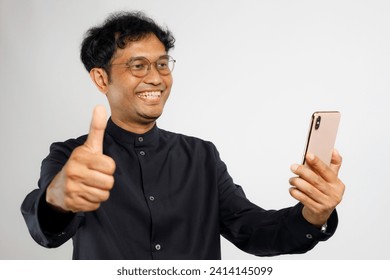 Excited happy young manfeeling joy using smartphone winning lottery game, betting, stock market, getting cashback online gift in mobile app message holding cell phone isolated on white background. - Powered by Shutterstock