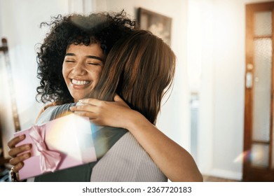 Excited, hug and present box for birthday of girl friends and smile with gratitude together. Surprise, gift and happy female person at home with giving and celebration, congratulations and package - Powered by Shutterstock