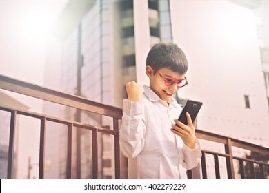 Excited Kid With Phone