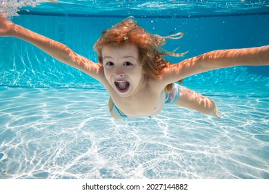 Excited kid swim underwater in pool. Child under water. Funny face portrait of child boy swimming and diving underwater with fun in pool. Summer fun with children. Family summer vacation.