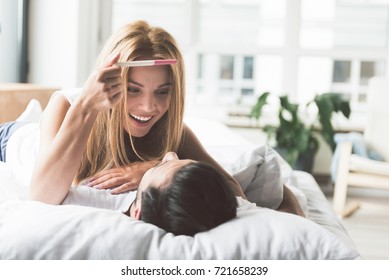 Excited lady telling husband about her pregnancy