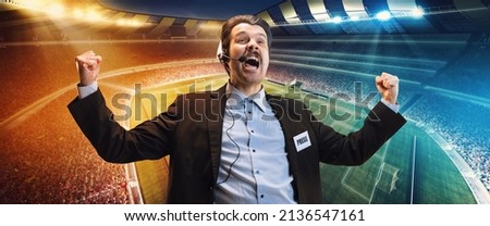 Excited man, professional sport commentator having online broadcast of football match isolated over sport stadium background. Winning game. Sport news. Football fans. Concept of profession, emotions