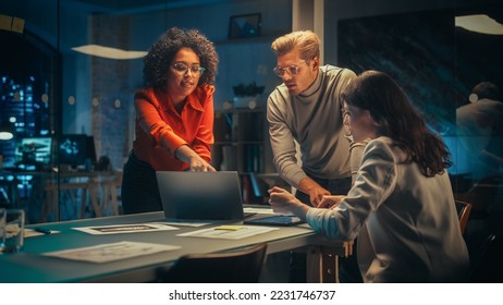 Excited Marketing Manager Leading a Team Meeting in Creative Office Conference Room in the Evening. Confident Multiethnic Female DIscussing a New Project Plan with Agency Employees. - Shutterstock ID 2231746737
