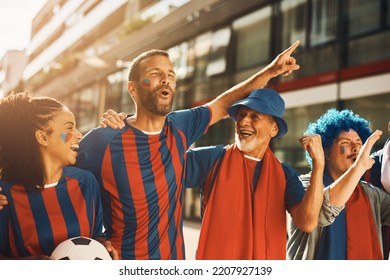 Excited Soccer Fans Having Fun While Celebrating Victory Of Their Team On The Street.