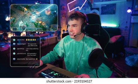 Excited Streamer Playing a Video Game Online. Stylish Man Streaming His Gaming Progress from Home in Living Room Apartment. Followers Engaging Through Interface During Live Broadcast on Internet. - Powered by Shutterstock