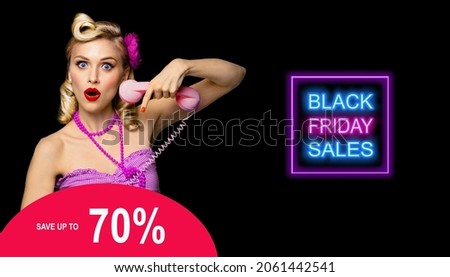 Excited surprised astonished pinup woman with 70% save text. Pin up shocked girl with phone and open mouth. Blond model retro fashion and vintage concept. Black Friday sales neon light sign. Shopping.